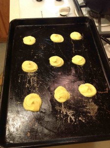 6 rounds of yellow batter on a standard sized baking sheet.