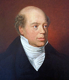 a Regency portrait of a balding Jewish guy, probably in early middle age, in a dark coat and white cravat.