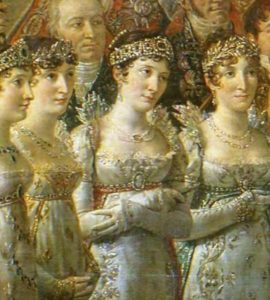 A section showing four young women wearing tiaras and fancy dresses from Jacques-Louis David's large painting of Napoleon's coronation